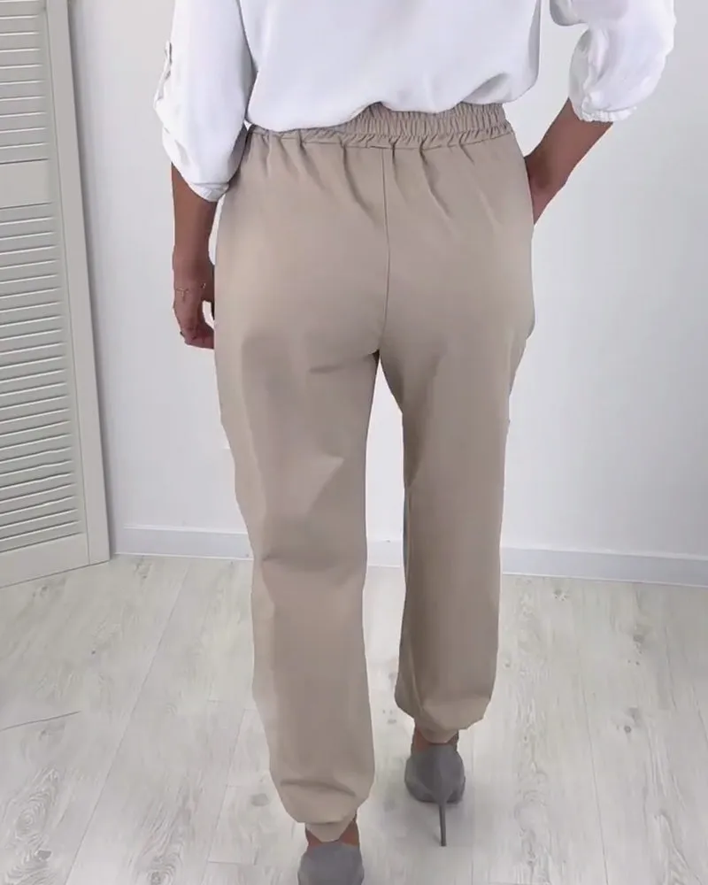 Fashionable solid color lanyard pocket pants